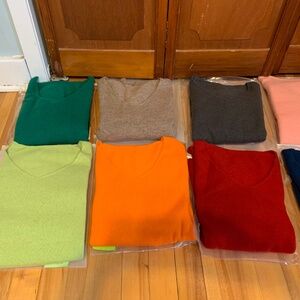 New soft 100% wool v-neck sweaters, med, $36. Available in a variety of colours.